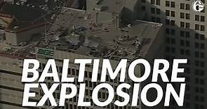 Downtown Baltimore building explosion injures 23, traps workers
