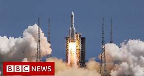 Debris from Chinese rocket falls back to Earth - BBC News