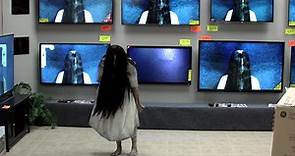 Watch the girl from 'The Ring' crawl out of a TV and scare people in this prank