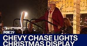 Chevy Chase visits Harbaugh Village lights display