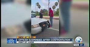 Officer suspended after confrontation