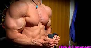 young bodybuilder showing his pumped muscle | flexing | muscle worship