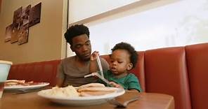 Dad, baby who went viral last week now starring in Denny's commercial