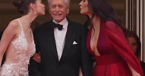Michael Douglas escorted the two leading ladies in his life, Catherine Zeta-Jones and their daughter Carys Zeta Douglas on the red carpet at the 76th Annual Cannes Film Festival Opening Ceremony ❤️ | HELLO!