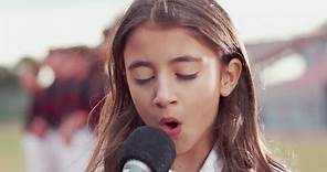 Watch: Reina Ozby Sings The Star-Spangled Banner