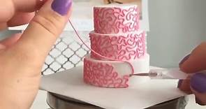 Tiny, Clay Replicas Of Wedding Cakes