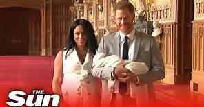 Prince Harry and Meghan Markle show off their new baby Archie to the world