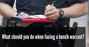 What should you do when facing a bench warrant?