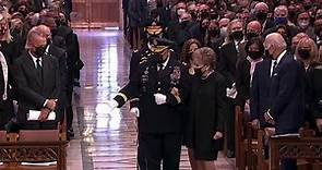 President Biden comforts to Bob Dole's wife at his funeral