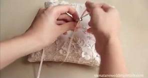 attaching wedding ring to your ring pillow