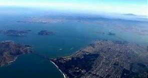 Aerial view of San Francisco Bay Area, Golden Gate Bridge, and Alcatraz.