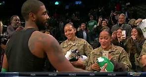 Kyrie Irving gives jersey and shoes to veterans sitting courtside | ESPN