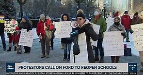 Protesters gather at Queen's Park over schools