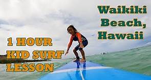 Kid Surfing Lesson with Kahu Surf School Hawaii Waikiki Beach