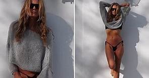 Elle Macpherson showcases her flawless figure in a bikini
