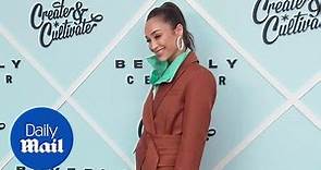 Cara Santana bundles up in brown trench coat at Beverly Center