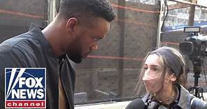 Lawrence Jones confronts young anti-Israel protesters over Hamas terror