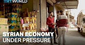 Syria's economy cracks under global crisis