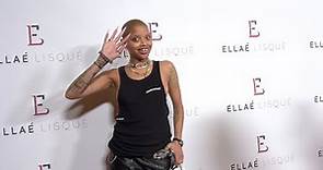 Slick Woods attends “Ellaé Lisqué Birthday Collection Fashion Show" Red Carpet