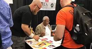 CSA Shows - Frank Robinson signing autographs for fans