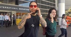 Dave Navarro And Girlfriend Have A Conference Cell Phone Chat As They Arrive In L.A.