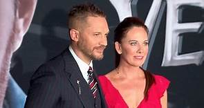 2018: Tom Hardy looks dapper with Kelly Marcel at Venom premiere