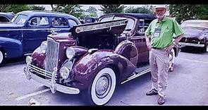 1940 Packard 120 Convertible with the owner Mike explaining the cars history.
