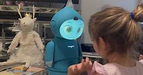 Girl is captivated by Moxie, the world's first AI robot for kids || WooGlobe