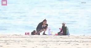 EXCLUSIVE PICTURES: Bradley Cooper enjoys beach time with Irina and baby Lea
