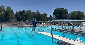 Splish-Splash, hundreds of people cool down at the City Park Pool in Pueblo