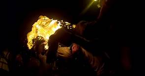 Ottery St Mary: Flaming tar barrels carried through streets