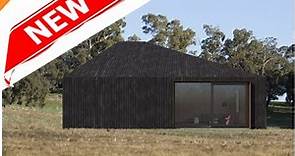 Adam kane architects designs asymmetrical timber cabin in rural victoria