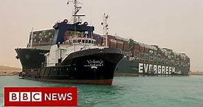 Suez Canal blocked after huge container ship wedged across it - BBC News