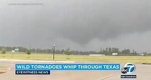 Video: Tornado whips across Texas interstate, sending debris flying and snapping power lines