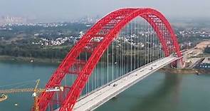Construction of the largest and longest arch bridge in the world here one place. Pingnan, China