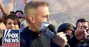 Portland mayor tear-gassed, shouted down during address to protesters
