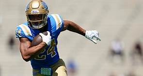 UCLA's Charbonnet fights through tackles to score as part of 3-TD game