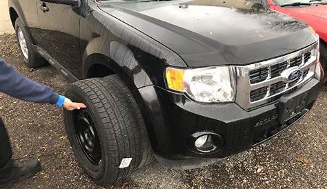 Snow tires and rims were on a 2011 Ford Escape 235/70/16 | Rick's Junk