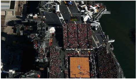 college basketball game on aircraft carrier