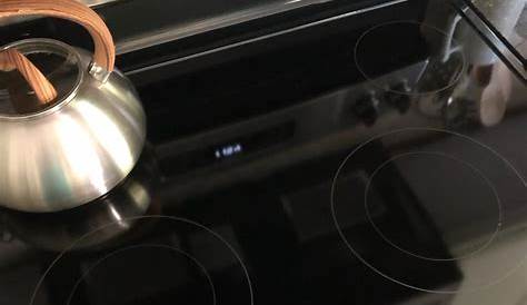 Our just over one year old GE ceramic cooktop stove heat light stays on