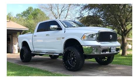 2017 Ram 1500 with 24x14 -76 TIS 544BM and 35/12.5R24 Fury Offroad