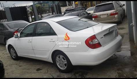 WHITE TOYOTA CAMRY LE 2003
