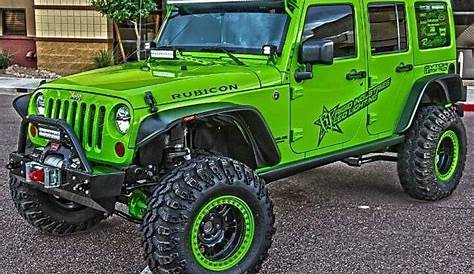 green 4 door jeep wrangler