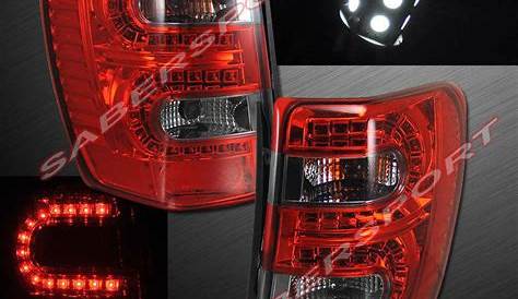 Sell 99-04 JEEP GRAND CHEROKEE "L.E.D." TAIL LIGHTS PAIR w/ SMD LED