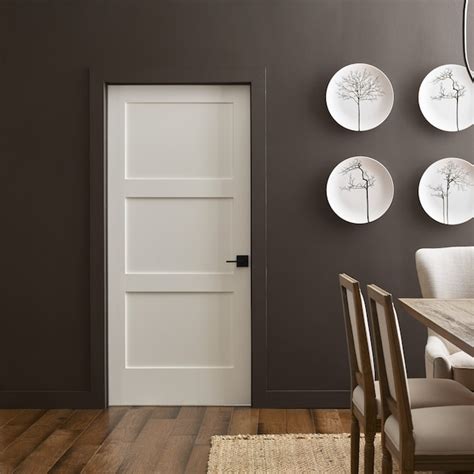 MMI DOOR 56-in x 80-in Primed Solid core 3-panel Universal Smooth ...