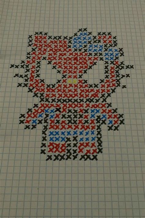 An Image Of A Hello Kitty Cross Stitched On To A Sheet Of Graph Paper