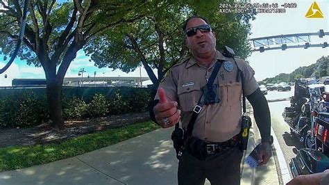 Cop who pinned Tyreek Hill to the floor taunts NFL star over Miami ...