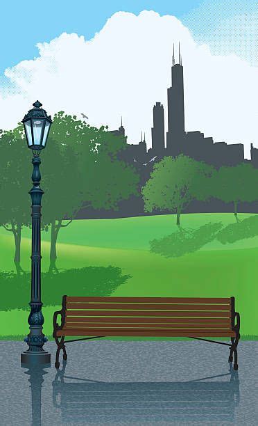 A Park Bench Sitting Next To A Lamp Post