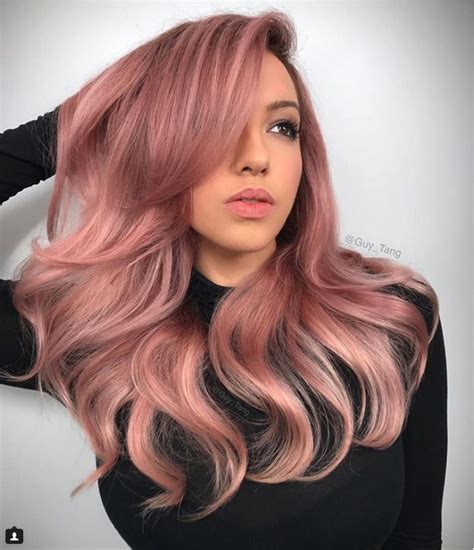 True to millennial form, pink champagne hair is also open to various levels of commitment: dusky pink pastel hair | Rose gold hair blonde, Hair color rose gold, Pink hair