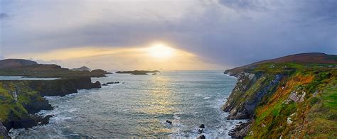Panoramic Valentia Island Cliffs With View On Great Skelligs By Sunset